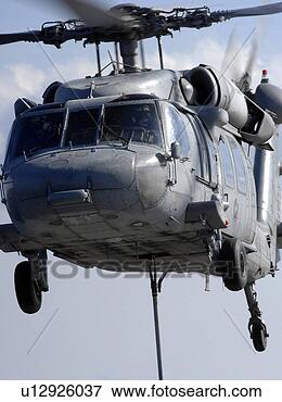 Picture - an mh-60s seahawk 
delivers a pallet. 
fotosearch - search 
stock photos, 
pictures, images, 
and photo clipart