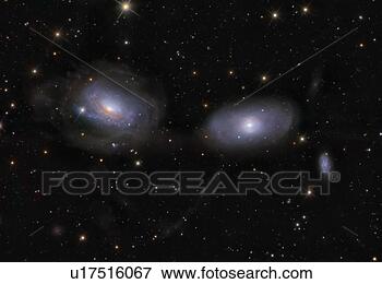 Stock Illustration - gravitionaly distorted 
galaxies ngc 3169 
and ngc 3166. 
fotosearch - search 
clipart, illustration, 
drawings and vector 
eps graphics images
