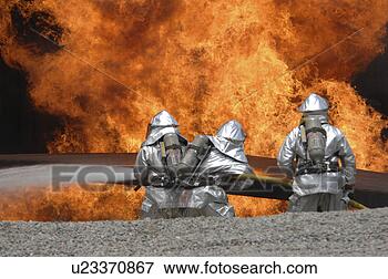 Picture - us air force airmen 
neutralize a live 
fire during a 
field training. 
fotosearch - search 
stock photos, 
pictures, images, 
and photo clipart