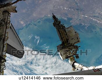 Stock Photo - space shuttle 
robotic arm moves 
an external stowage 
platform. fotosearch 
- search stock 
photos, pictures, 
images, and photo 
clipart