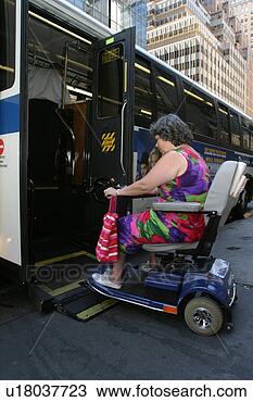 Stock Photo - woman using a 
scooter/cart for 
mobility getting 
on a city bus 
via a. fotosearch 
- search stock 
photos, pictures, 
images, and photo 
clipart