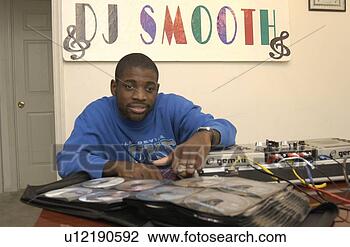 Stock Photo - african-american 
man with multiple 
disabilities, 
 preparing for 
his. fotosearch 
- search stock 
photos, pictures, 
images, and photo 
clipart