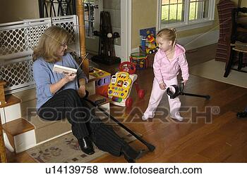 Stock Photo - a grandmother 
enjoys time with 
her grand daughter. 
fotosearch - search 
stock photos, 
pictures, images, 
and photo clipart