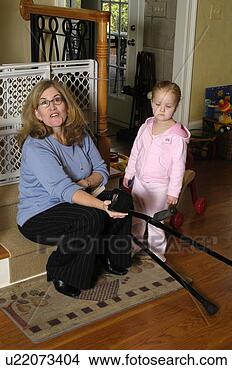 Stock Photo - a grandmother 
enjoys time with 
her grand daughter. 
fotosearch - search 
stock photos, 
pictures, images, 
and photo clipart