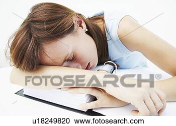 Stock Photography - businesswoman 
asleep over file. 
fotosearch - search 
stock photos, 
pictures, wall 
murals, images, 
and photo clipart