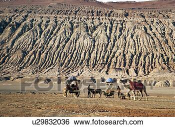 Stock Photo - overlook of people 
on cameras, mountain 
of fire, tulufan, 
sinkiang. fotosearch 
- search stock 
photos, pictures, 
images, and photo 
clipart