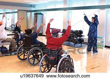 Stock Photograph - group of people 
with disabilities, 
 all utilizing 
wheelchairs or. 
fotosearch - search 
stock photos, 
pictures, images, 
and photo clipart