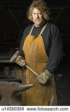 http://comps.fotosearch.com/comp/UNW/UNW801/caucasian-male-metalsmith_~u14350359.jpg