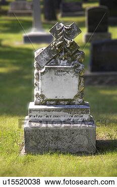 Stock Photo - headstone in graveyard. 
fotosearch - search 
stock photos, 
pictures, images, 
and photo clipart