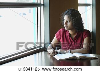 Stock Image - teenage female 
student pondering. 
fotosearch - search 
stock photos, 
pictures, images, 
and photo clipart