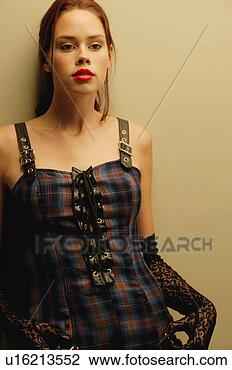 Stock Photo - woman with plaid 
dress. fotosearch 
- search stock 
photos, pictures, 
images, and photo 
clipart