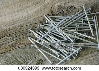 Stock Photo - a pile of nails. 
fotosearch - search 
stock photos, 
pictures, images, 
and photo clipart