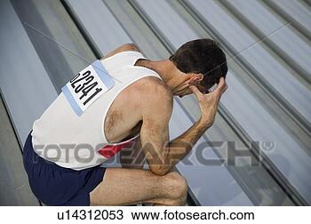 Stock Photo - athlete feels 
defeat. fotosearch 
- search stock 
photos, pictures, 
images, and photo 
clipart