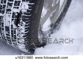 Stock Photography - snowy car tire. 
fotosearch - search 
stock photos, 
pictures, images, 
and photo clipart