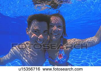Stock Photo - young couple in 
swimming pool. 
fotosearch - search 
stock photos, 
pictures, images, 
and photo clipart