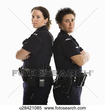 Stock Image - portrait of two 
mid adult caucasian 
policewomen standing 
back to back. 
fotosearch - search 
stock photos, 
pictures, images, 
and photo clipart