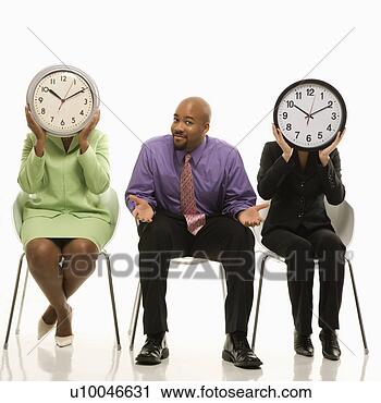 Stock Photography - businesswomen 
sitting holding 
clocks over faces 
while. fotosearch 
- search stock 
photos, pictures, 
images, and photo 
clipart