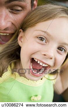 Stock Photo - father and daughter 
in park. fotosearch 
- search stock 
photos, pictures, 
images, and photo 
clipart