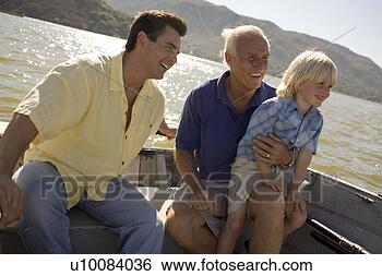 Stock Photo - grandfather, son 
and grandson in 
boat. fotosearch 
- search stock 
photos, pictures, 
images, and photo 
clipart