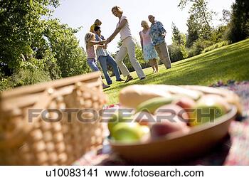 Stock Photography - grandparents and 
family in park. 
fotosearch - search 
stock photos, 
pictures, images, 
and photo clipart