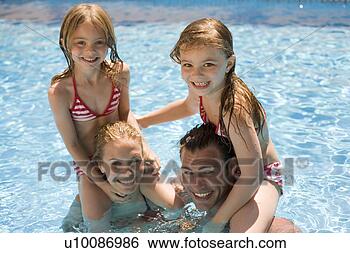 Stock Photo - family playing 
in pool. fotosearch 
- search stock 
photos, pictures, 
images, and photo 
clipart