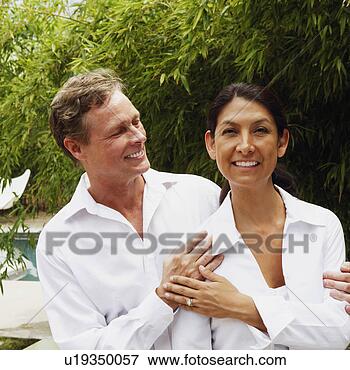 Picture - mature couple 
standing together. 
fotosearch - search 
stock photos, 
pictures, images, 
and photo clipart