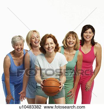 Stock Photo - portrait of a 
mature woman holding 
a basketball with 
her four friends. 
fotosearch - search 
stock photos, 
pictures, images, 
and photo clipart