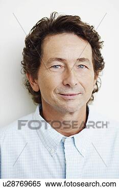 Stock Image - portrait of a 
mature man grinning. 
fotosearch - search 
stock photos, 
pictures, images, 
and photo clipart