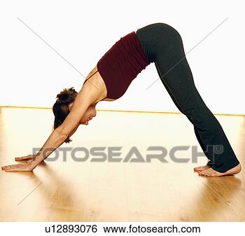 Stock Photo - side profile of 
a mid adult woman 
in a dog position. 
fotosearch - search 
stock photos, 
pictures, images, 
and photo clipart