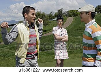 Foto - vista,  dois, 
 men,  tendo, 
 discussão,  durante, 
 golfe,  jogo. 
fotosearch - busca 
de fotos, imagens 
e clipart