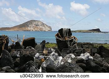 Stock Photo - view of rough 
rocks placed near 
water. fotosearch 
- search stock 
photos, pictures, 
images, and photo 
clipart