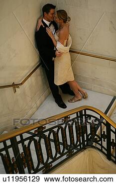 Stock Photograph - couple on a staircase. 
fotosearch - search 
stock photos, 
pictures, images, 
and photo clipart