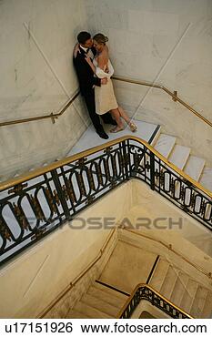 Stock Photo - couple on a staircase. 
fotosearch - search 
stock photos, 
pictures, images, 
and photo clipart