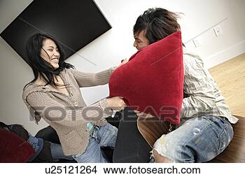 Stock Photo - couple in playful 
mood, side view. 
fotosearch - search 
stock photos, 
pictures, images, 
and photo clipart