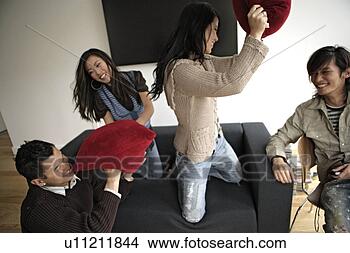 Stock Photo - friends in playful 
mood, side view. 
fotosearch - search 
stock photos, 
pictures, images, 
and photo clipart