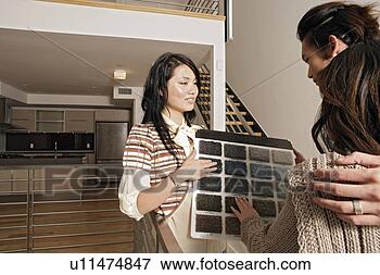 Picture - friends selecting 
color shade. fotosearch 
- search stock 
photos, pictures, 
images, and photo 
clipart