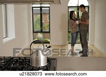 Stock Photo - young couple in 
discussion, full 
length. fotosearch 
- search stock 
photos, pictures, 
images, and photo 
clipart