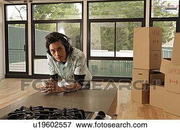 Picture - young holding 
bowl, front view. 
fotosearch - search 
stock photos, 
pictures, images, 
and photo clipart