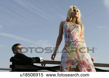 Stock Image - caucasian couple 
at a bench. fotosearch 
- search stock 
photos, pictures, 
images, and photo 
clipart