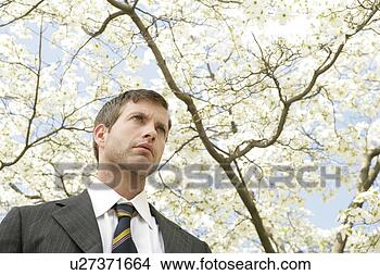 Stock Photo - man outside in 
jacket and tie. 
fotosearch - search 
stock photos, 
pictures, images, 
and photo clipart