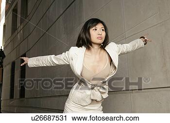 Stock Photography - asian woman with 
her arms wide 
open. fotosearch 
- search stock 
photos, pictures, 
images, and photo 
clipart