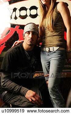 Stock Photograph - couple posing 
in front of a 
mural. fotosearch 
- search stock 
photos, pictures, 
images, and photo 
clipart