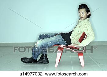 Stock Photo - man seated on 
chair, portrait. 
fotosearch - search 
stock photos, 
pictures, images, 
and photo clipart