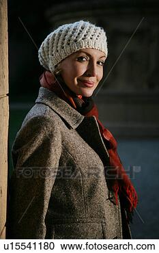 Stock Photography - mature woman in 
hat and scarf 
looking at camera. 
fotosearch - search 
stock photos, 
pictures, images, 
and photo clipart