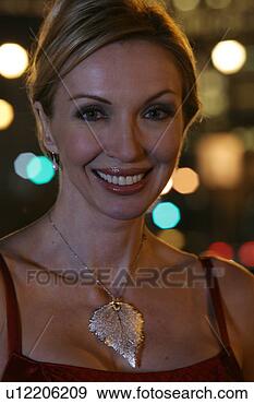 Stock Photograph - mature woman looking 
at camera. fotosearch 
- search stock 
photos, pictures, 
images, and photo 
clipart