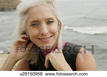 Stock Photo - portrait of a 
mature woman. 
fotosearch - search 
stock photos, 
pictures, images, 
and photo clipart