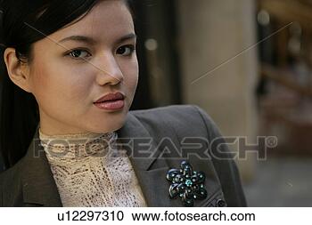 Stock Photography - portrait of young 
asian woman. fotosearch 
- search stock 
photos, pictures, 
images, and photo 
clipart