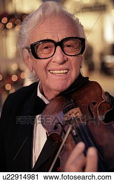 Stock Photography - senior musician. 
fotosearch - search 
stock photos, 
pictures, images, 
and photo clipart