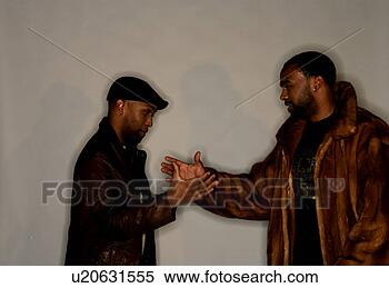 Stock Image - two african-american 
meeting greeting 
each other. fotosearch 
- search stock 
photos, pictures, 
images, and photo 
clipart