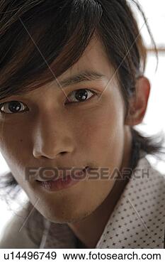 Stock Photograph - young man, close-up. 
fotosearch - search 
stock photos, 
pictures, images, 
and photo clipart